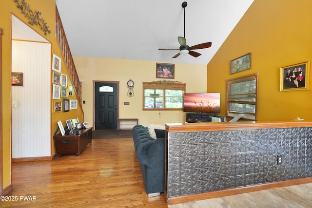 135 Kiel Rd, Milford, PA 18337 - living area featuring wood finished floors, ceiling fan, and high vaulted ceiling
