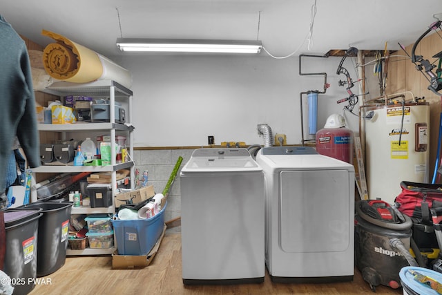 135 Kiel Rd, Milford, PA 18337 - laundry area featuring gas water heater, separate washer and dryer, and wood finished floors