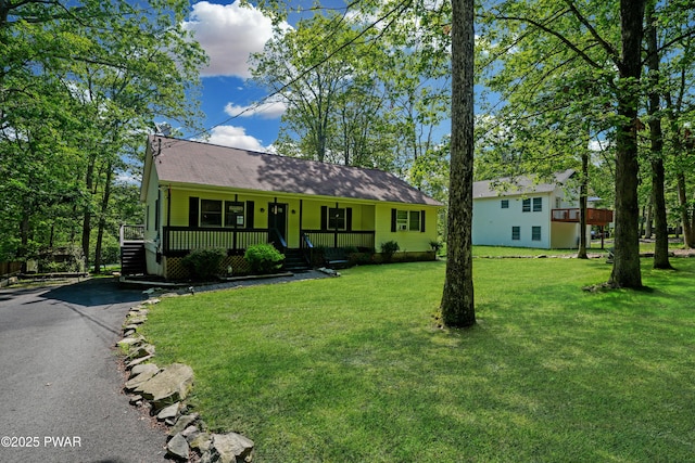 135 Kiel Rd, Milford, PA 18337 - view of front facade featuring a porch, a front yard, and driveway