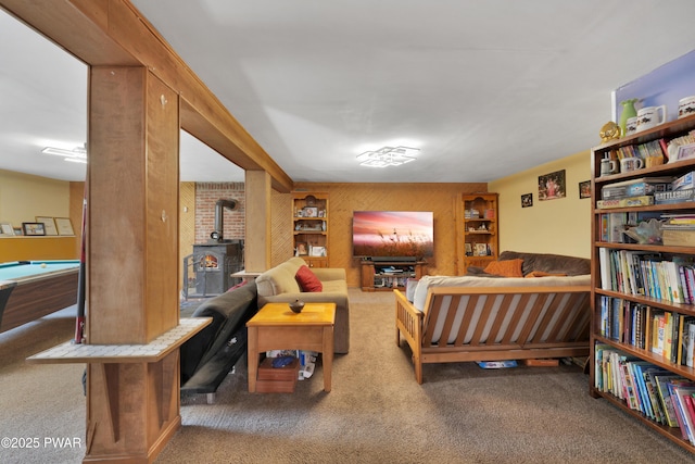 135 Kiel Rd, Milford, PA 18337 - carpeted living area with a wood stove