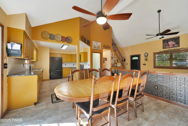 135 Kiel Rd, Milford, PA 18337 - dining space featuring a ceiling fan, high vaulted ceiling, and stairway