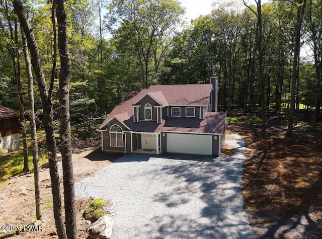 front facade with a garage