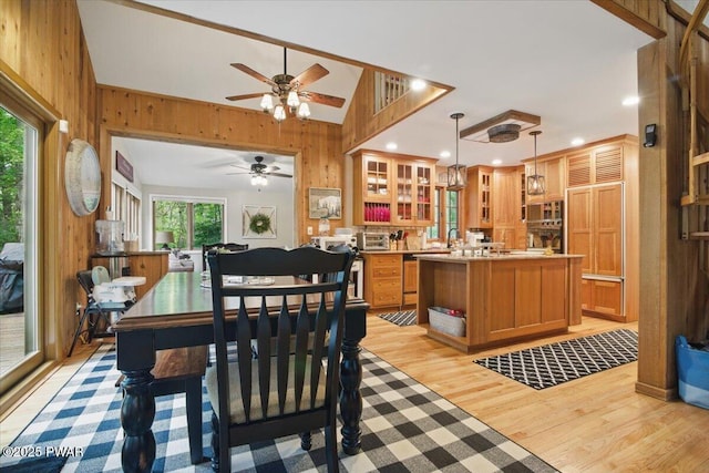 141 Arrowhead Cir, Newfoundland, PA 18445 - dining room with wood walls, light wood-style floors, ceiling fan, and recessed lighting