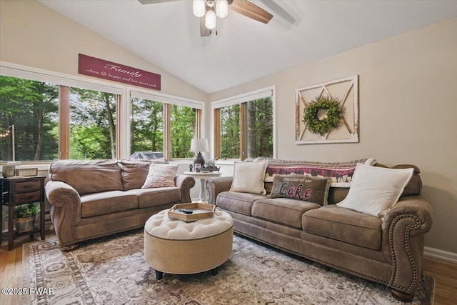 141 Arrowhead Cir, Newfoundland, PA 18445 - living area featuring wood finished floors, lofted ceiling, and ceiling fan