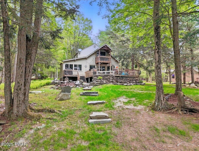 141 Arrowhead Cir, Newfoundland, PA 18445 - back of property with a deck and a balcony
