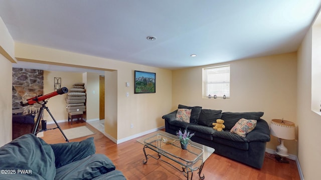 living room with wood finished floors and baseboards