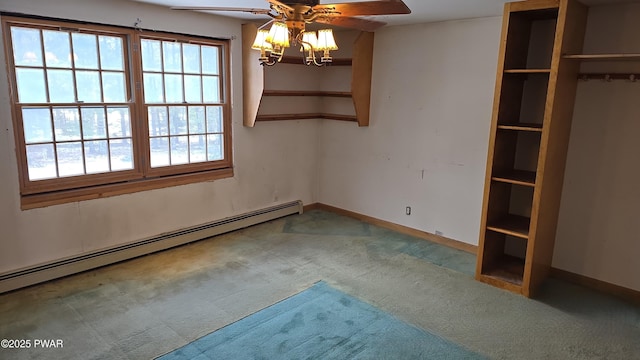 unfurnished bedroom with ceiling fan, a baseboard radiator, and carpet