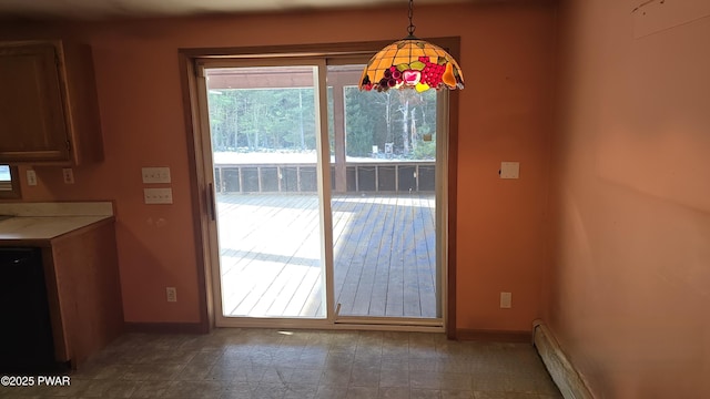 unfurnished dining area featuring a baseboard radiator