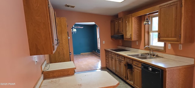 kitchen featuring a baseboard heating unit, sink, and black appliances