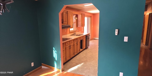 kitchen with sink and black appliances