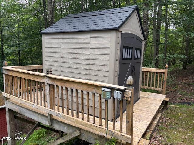 30 Bear Hill Rd, Lake Ariel, PA 18436 - wooden deck featuring a storage unit