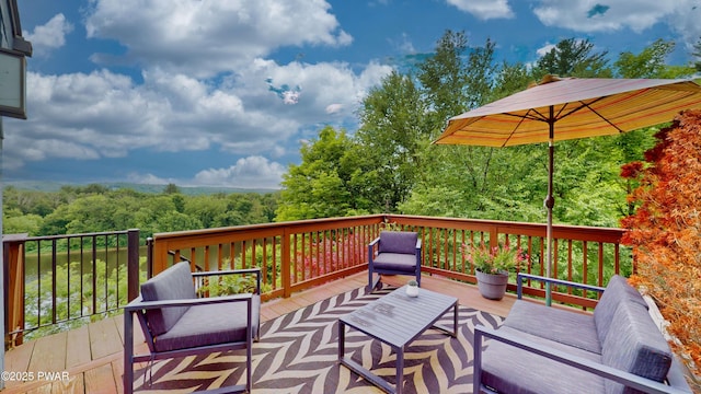 149 Bennett Ave Unit J, Milford, PA 18337 - wooden terrace with outdoor lounge area and a forest view