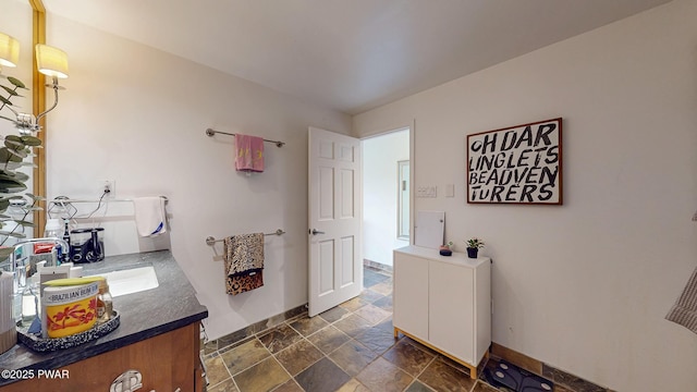 149 Bennett Ave Unit J, Milford, PA 18337 - bathroom featuring stone finish floors and vanity