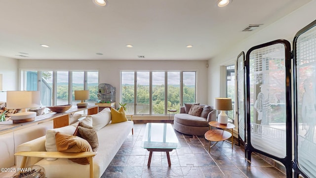 149 Bennett Ave Unit J, Milford, PA 18337 - living area featuring plenty of natural light, recessed lighting, and stone tile flooring