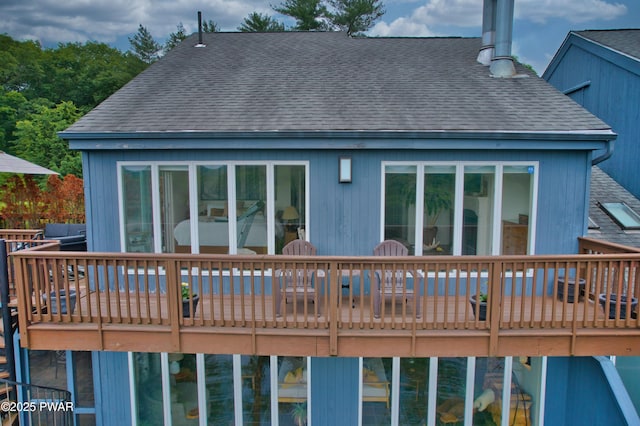 149 Bennett Ave Unit J, Milford, PA 18337 - rear view of house featuring roof with shingles and a deck