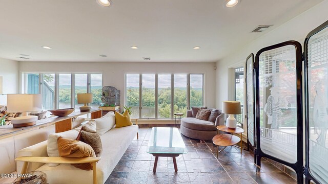 149 Bennett Ave Unit J, Milford, PA 18337 - living area featuring plenty of natural light, recessed lighting, and stone tile flooring