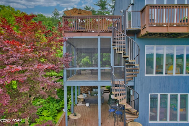 149 Bennett Ave Unit J, Milford, PA 18337 - deck with stairway and a sunroom