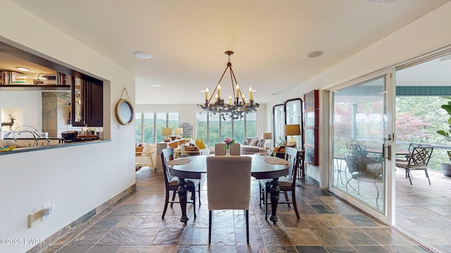 149 Bennett Ave Unit J, Milford, PA 18337 - dining area featuring stone tile floors, a chandelier, and recessed lighting
