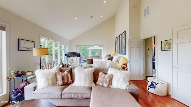 149 Bennett Ave Unit J, Milford, PA 18337 - living area featuring high vaulted ceiling, wood finished floors, and recessed lighting