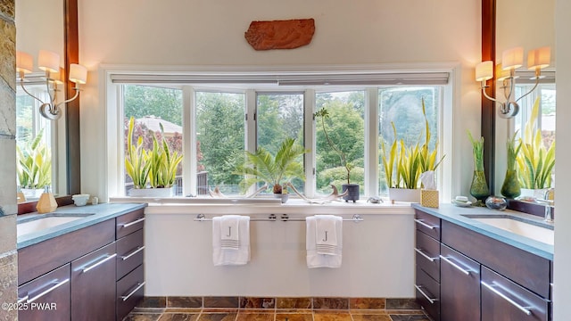 149 Bennett Ave Unit J, Milford, PA 18337 - full bathroom featuring two vanities and stone finish flooring