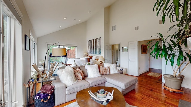149 Bennett Ave Unit J, Milford, PA 18337 - living room featuring high vaulted ceiling, hardwood / wood-style flooring, and recessed lighting