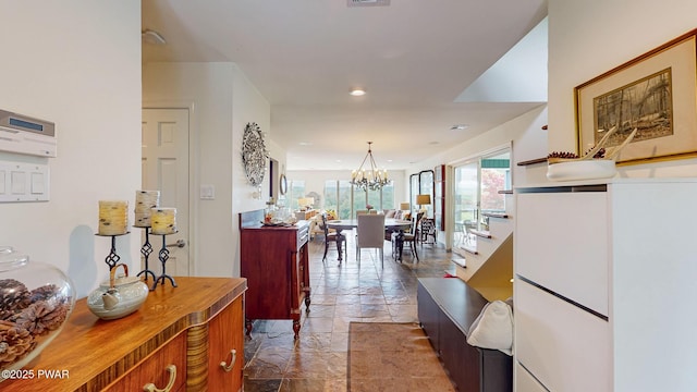 149 Bennett Ave Unit J, Milford, PA 18337 - corridor with stone tile flooring, a chandelier, and recessed lighting