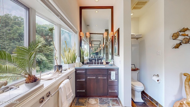 149 Bennett Ave Unit J, Milford, PA 18337 - bathroom featuring stone tile floors and vanity