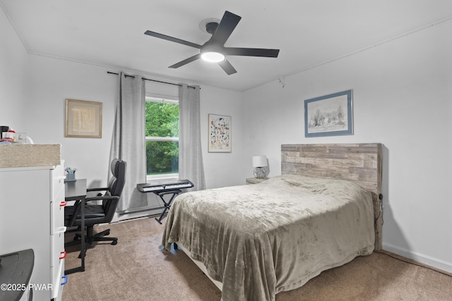 4 Pebble Ct, Lake Ariel, PA 18436 - bedroom with light carpet, an office area, a ceiling fan, and a baseboard radiator