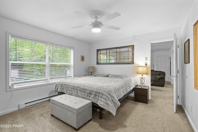 4 Pebble Ct, Lake Ariel, PA 18436 - carpeted bedroom with a baseboard heating unit, baseboards, and a ceiling fan