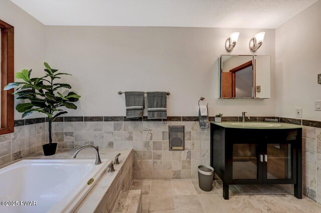 811 Maple Ridge Ct, Lords Valley, PA 18428 - full bath with tile walls, vanity, a bath, and a wainscoted wall