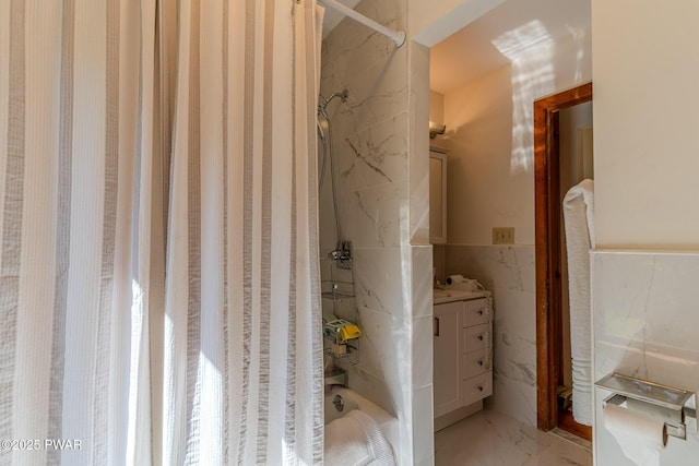 20 Clemen V Muller St, Beach Lake, PA 18405 - bathroom featuring marble finish floors, vanity, tile walls, shower / tub combo, and wainscoting