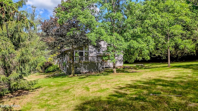 20 Clemen V Muller St, Beach Lake, PA 18405 - view of green lawn featuring a wooden deck