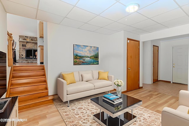 20 Clemen V Muller St, Beach Lake, PA 18405 - living area with light wood-type flooring, stairs, and a drop ceiling