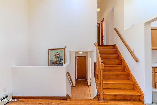 20 Clemen V Muller St, Beach Lake, PA 18405 - stairway featuring baseboard heating and a high ceiling