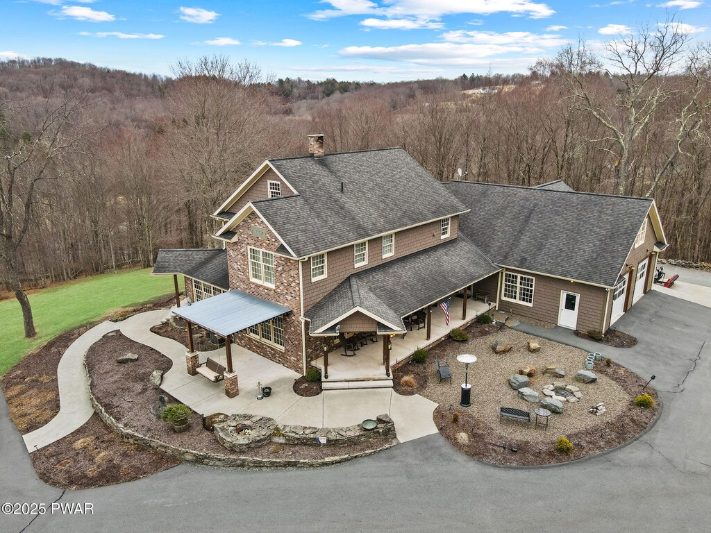 1902 Farmhouse Rd, Honesdale, PA 18431 - drone / aerial view with a wooded view