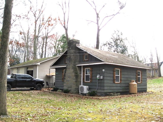 view of property exterior featuring a yard