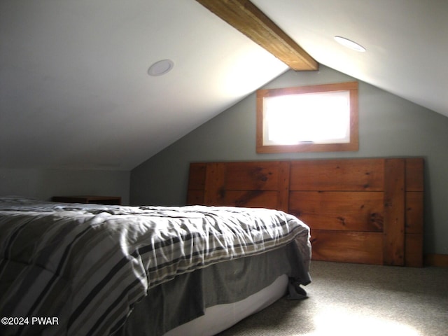 carpeted bedroom featuring lofted ceiling