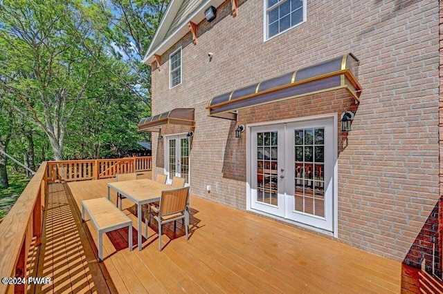 wooden terrace featuring french doors