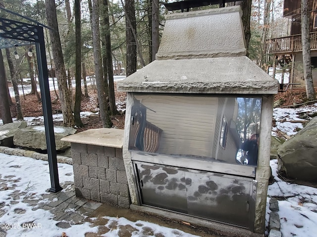 view of snow covered patio