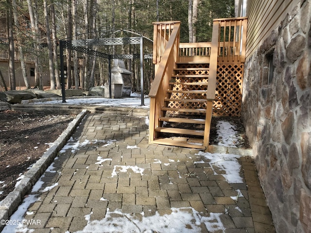 view of snow covered patio