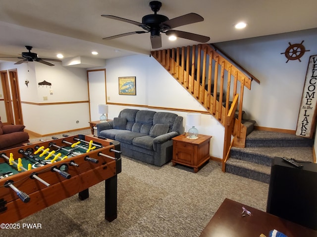 playroom featuring ceiling fan and carpet flooring