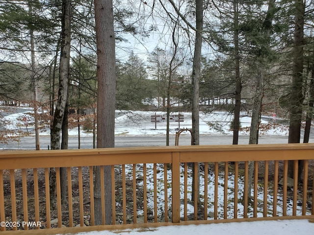 view of snow covered deck