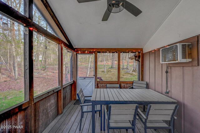 3218 Bluebird Dr, Bushkill, PA 18324 - sunroom featuring lofted ceiling, ceiling fan, healthy amount of natural light, and a wall mounted air conditioner