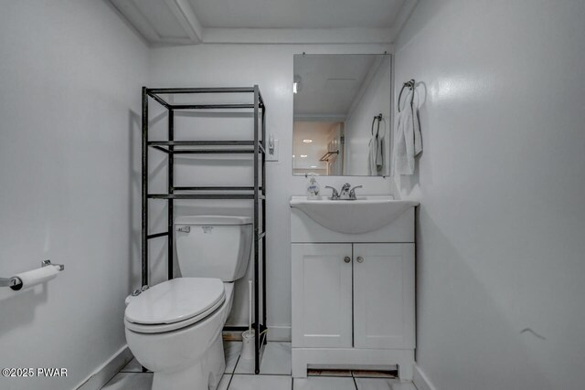 3218 Bluebird Dr, Bushkill, PA 18324 - bathroom featuring toilet, vanity, baseboards, and tile patterned floors