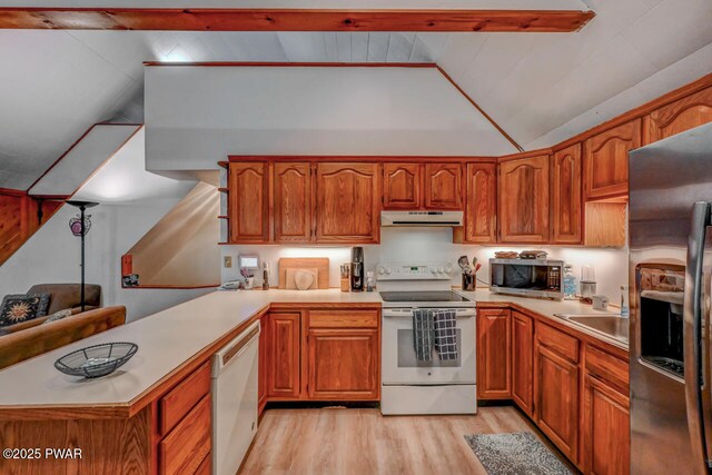 3218 Bluebird Dr, Bushkill, PA 18324 - kitchen featuring appliances with stainless steel finishes, exhaust hood, lofted ceiling, a peninsula, and light wood-style floors