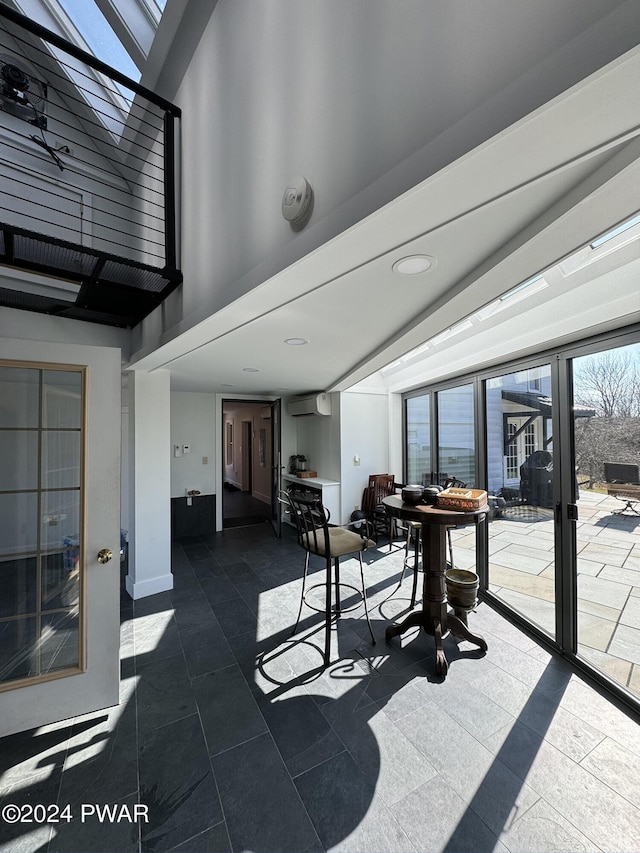 view of patio / terrace featuring a wall unit AC