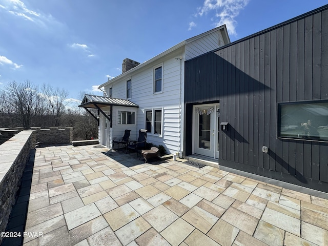 rear view of house with a patio