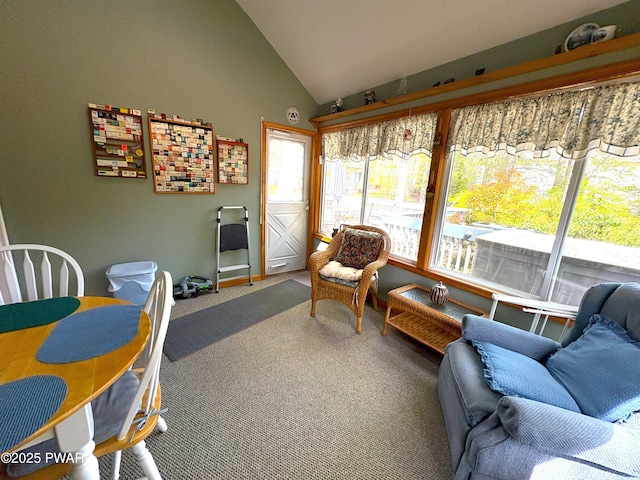 sunroom / solarium featuring lofted ceiling
