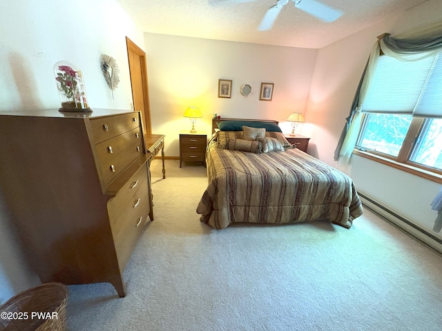 bedroom featuring light carpet and a ceiling fan