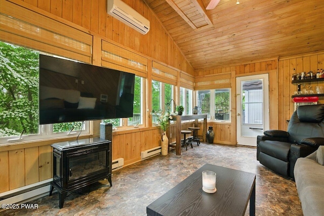 202 Remuda Dr, Lords Valley, PA 18428 - living area featuring an AC wall unit, vaulted ceiling, baseboard heating, wood walls, and wood ceiling
